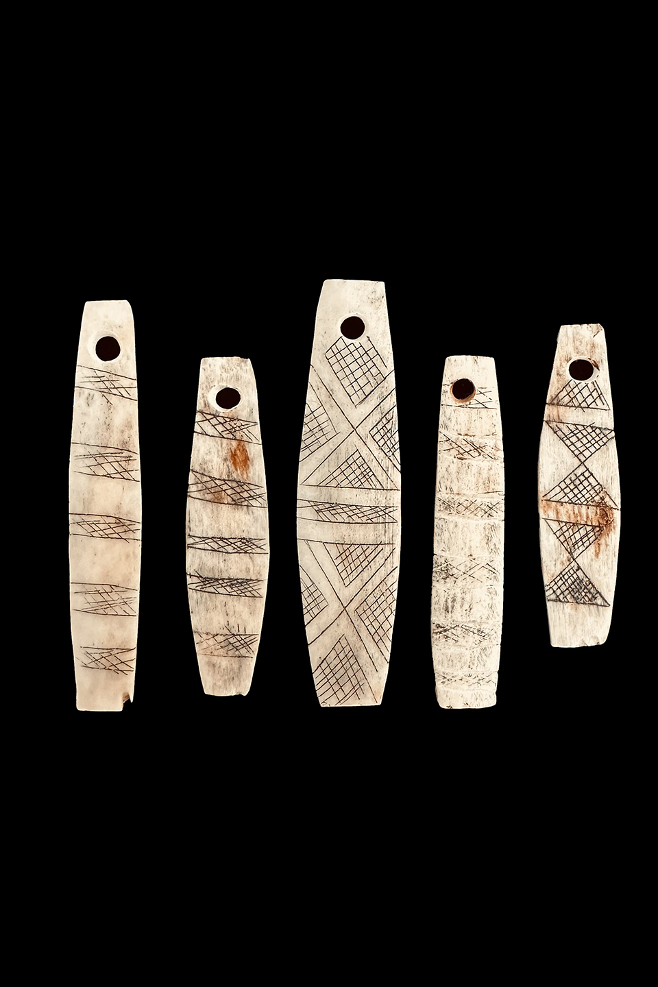 5 Incised Bone Pendants from Baby Carrier - Shipibo-Conibo and Campa people, Peru