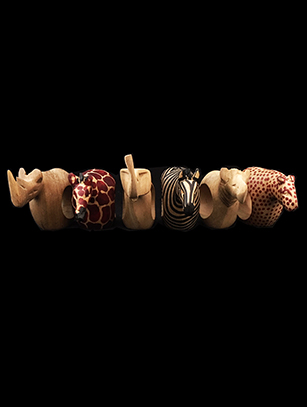 Carved wood animal napkin rings from Kenya Africa antelope giraffe zebra lion sculptures hand carved artisan table art set of 4