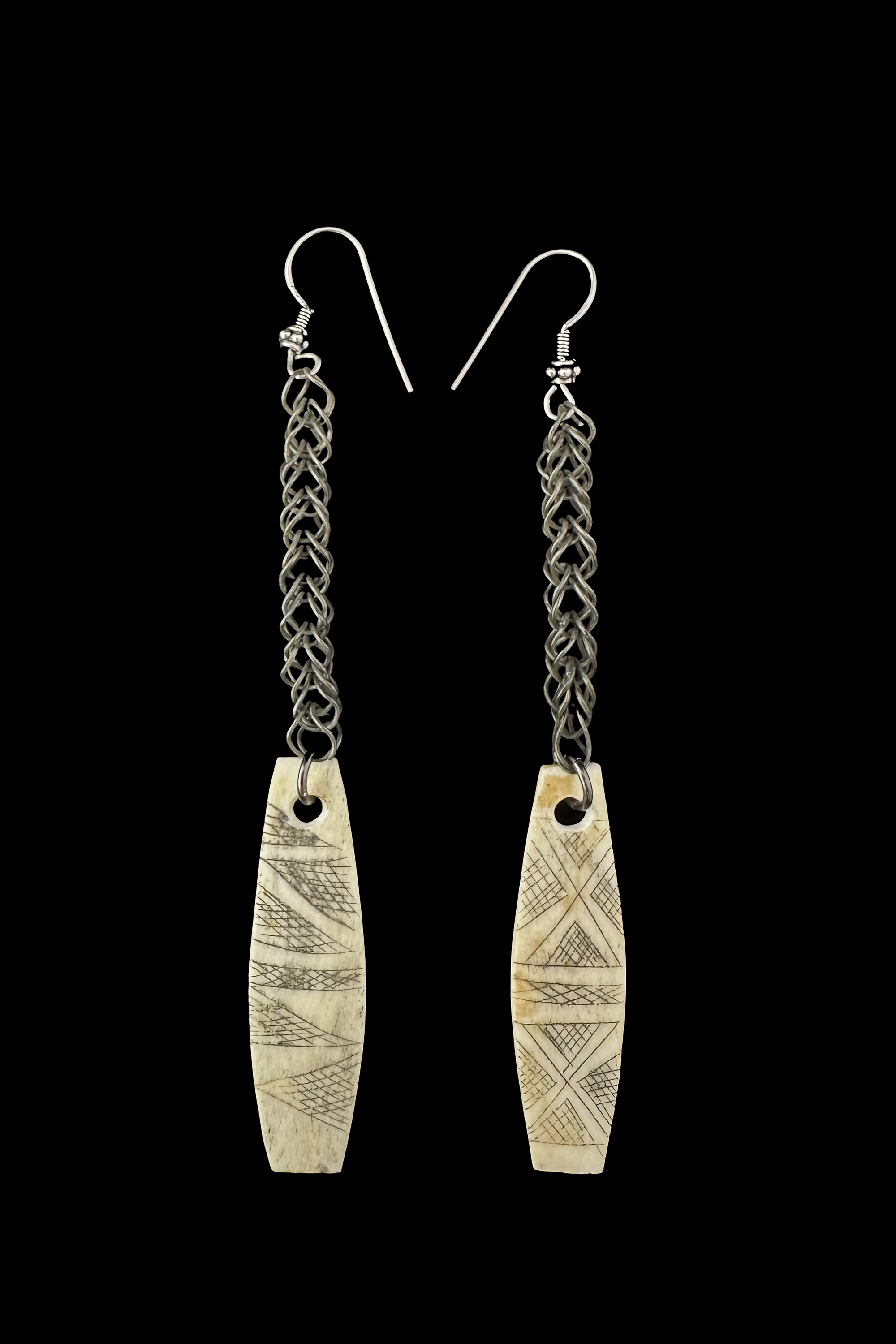 Bone Earrings from a baby sling on a chain