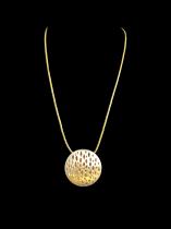 Circular Pierced Sterling Silver Disc with a Gold Vermeil Backplate