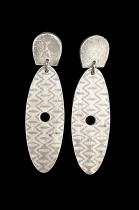 Clay posted Earrings with tribal design. #12