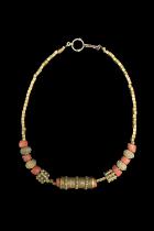 Necklace with Bronze Hair Tube and Coral Colored Glass Beads